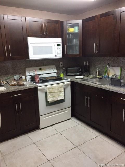 PALM COURT OF MIAMI CONDO - Residential