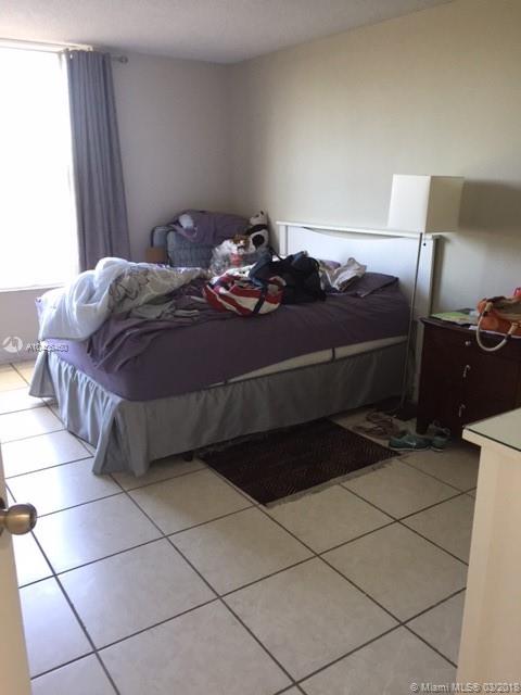 PALM COURT OF MIAMI CONDO - Residential