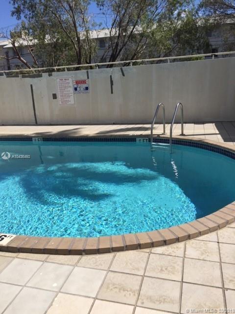 PALM COURT OF MIAMI CONDO - Residential