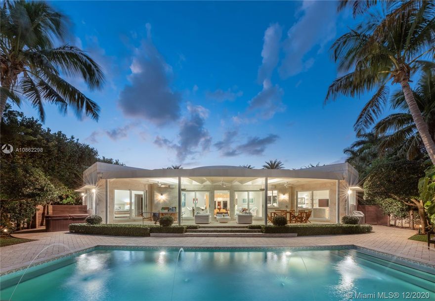 One-of-a-kind, luxury waterfront situated on a huge 20,373-SF lot on quiet Flamingo Dr., minutes to the best of South Beach! This art deco home has been superbly remodeled to accentuate the unique deco features yet accommodate the needs of a modern family. Open floor plan & soaring high ceilings will welcome you inside a grand living room, a chef’s kitchen equipped with high-end appliances, and a family room flawlessly connected with a formal dining – all overlooking the water. Outside, expansive backyard with a huge veranda, pool, dock, & a boat lift. 4 beds in the main house, detached 1-bed guesthouse, & a staff room. Large driveway can fit 10+ cars! Property is gated & secluded with manicured landscaping and high hedges. Lowest priced waterfront home on a 20,000-sf lot in Miami Beach!
