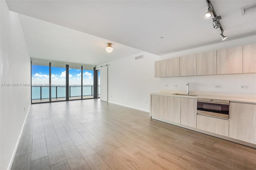 This 3 bdrm 3.5 bath corner unit condo in the Heart of Edgewater has an AMAZING, multi-million dollar, unobstructed view of the Biscayne Bay! This breathtaking condo features its own foyer entrance with private elevator access, European cabinetry, Sub-Zero & Wolf appliances, floor to ceiling windows, marble floors in the bathrooms & 2 private balconies, both with breathtaking bay views. The unit has porcelain tile throughout, custom closets & window treatments. One Paraiso has resort-like amenities which include 2 Olympic size pools, hot tub, state of the art fitness center, spinning room, yoga room, spa, steam room, sauna, party room, business center, children's playroom, game room & much more. Maintenance includes water, basic cable & internet and 1 assigned covered parking space.