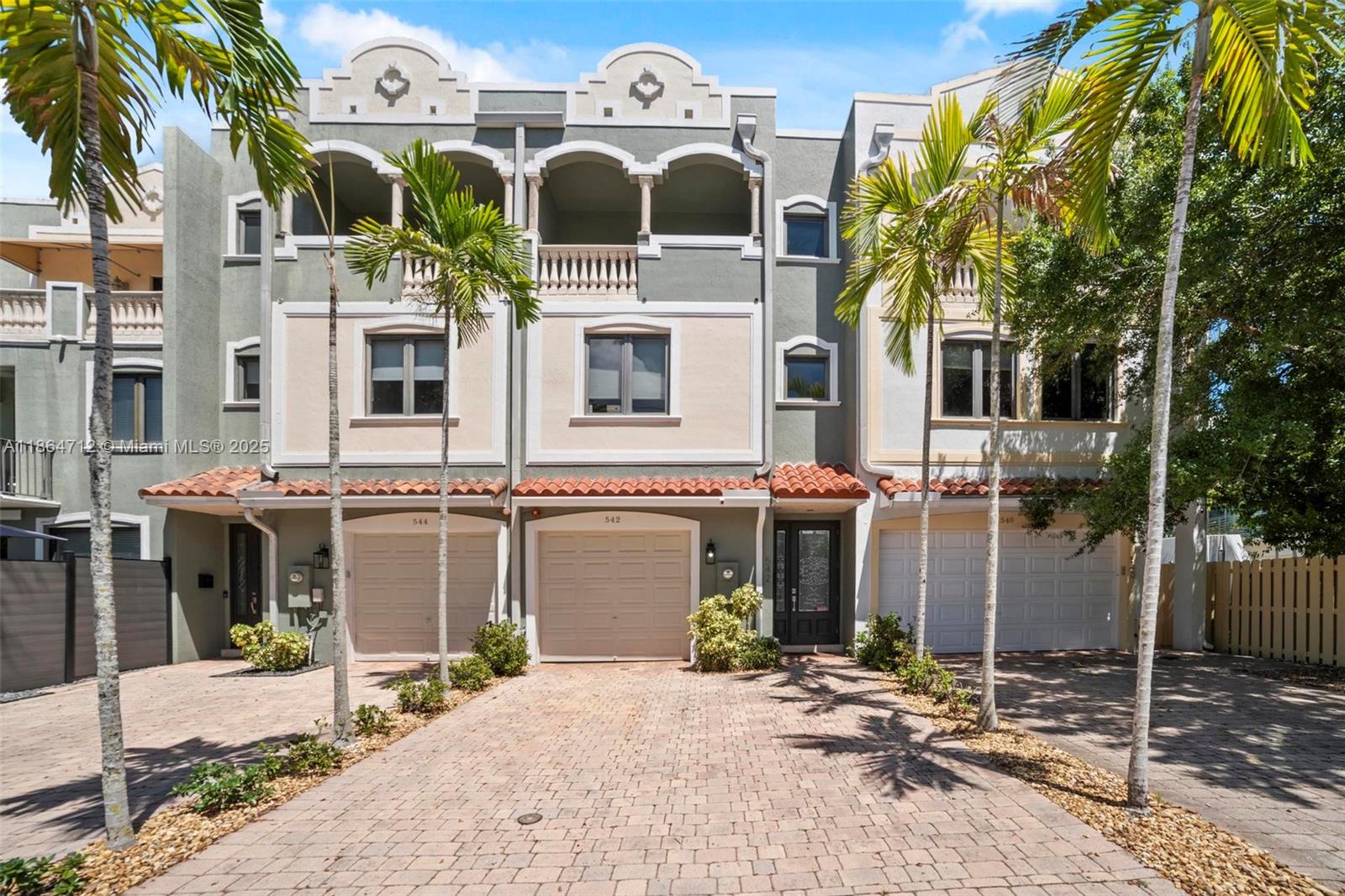 Sophisticated design meets everyday comfort in this luxurious multi-level 3BR + den/office, 3.5BA, 1 car garage, townhome in sought-after Victoria Park, featuring a private backyard oasis with salt system / heated pool, built-in grill, fridge, bar, and travertine pavers. Enjoy indoor/outdoor living from the bright and spacious 1st floor with SS appliances, granite counter tops and walnut cabinets. Home has its own elevator to access all three floors. Every bedroom has its own bath; two upstairs bedrooms offer private balconies on 3rd floor. The 2nd floor includes a spacious primary suite, den/office, and full laundry room. Exterior includes awnings, re-coated roof, and more. Quiet sought after Victoria Park neighborhood, minutes to Las Olas, beaches, and top dining.