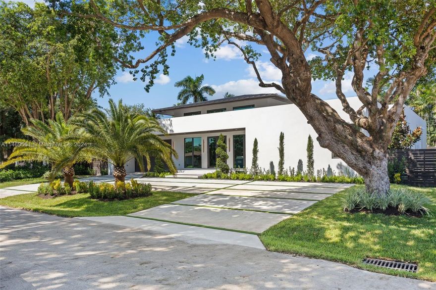 Luxury Living at its finest! This stunning contemporary 4-bedroom/4-bathroom single-family home located in Coral Ridge,one of the most sought-after neighborhoods in Fort Lauderdale. With an open floor plan,this home is perfect for entertaining. South-facing impact doors and windows create a bright and welcoming atmosphere,while the gourmet kitchen is a culinary enthusiast's dream come true.The primary suite is a true haven,complete with a volume tray ceiling,an oversized walk-in closet,and a lavish en-suite bathroom.Step outside to your own private tropical oasis with lush landscaping,an azure blue pool finish,and sun-shelf design.The property also boasts an attached two-car garage and a spacious laundry room. Don't miss out on this one-of-a-kind luxury home – schedule a viewing today!