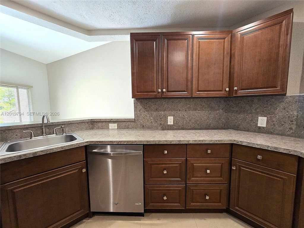 Photo of 3457 NW 44th St #205, Oakland Park, FL 33309 (MLS # A12019794)
