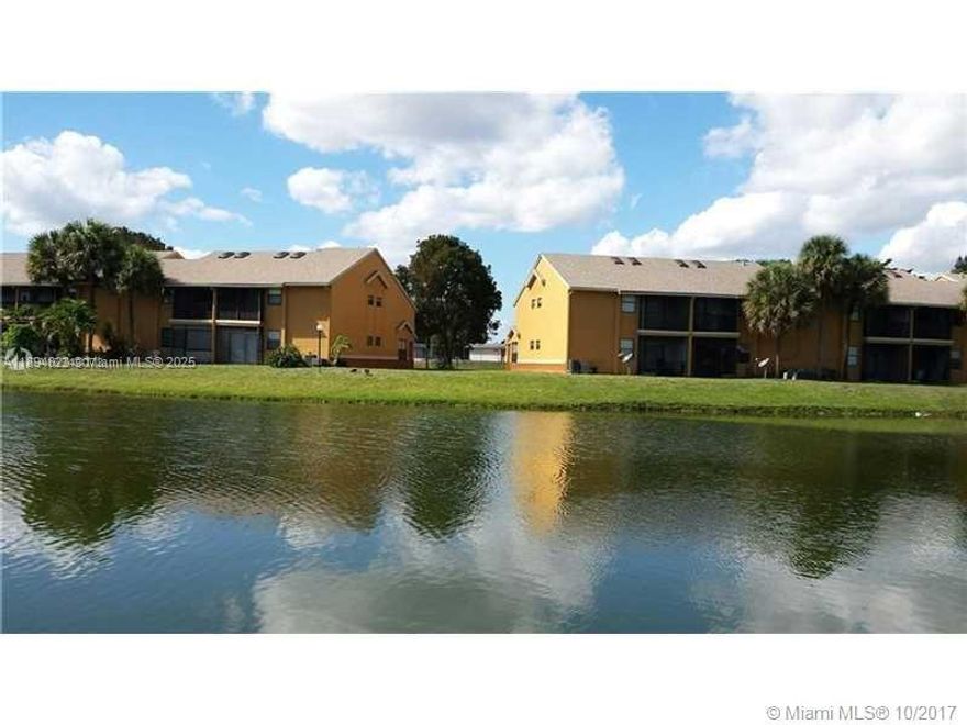 Spacious 2 beds 2 baths, Lake view, Vaulted Ceilings with skylights. 1st floor entrance. Features an open kitchen with dining room area, split floor plan. Washer and dryer inside the unit. Wood and tile floors, stainless steel Fridge, modern kitchen & Baths. Screened Porch/Balcony with Lake View. FREE STORAGE ROOM!! GREAT LOCATION CLOSE TO FLORIDA TURNPIKE AND SHOPPING CENTERS. INSIDE COMMUNITY YOU'LL FIND POOL AND CLUBHOUSE. School across park & Magnet School 2 blocks away. Unit in front of park with kids playground! Includes Storage room on 1st floor. Previous Tenant just moved out. Quick Move-In!! NO HOA APPROVAL!!