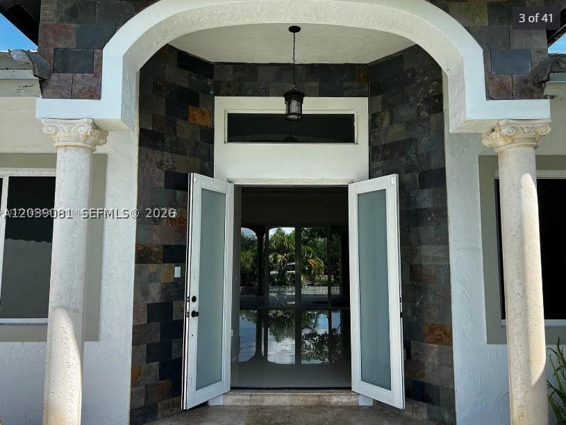 Photo of 6115 Marinel Say Dr, Davie, FL 33314 (MLS # A12039081)