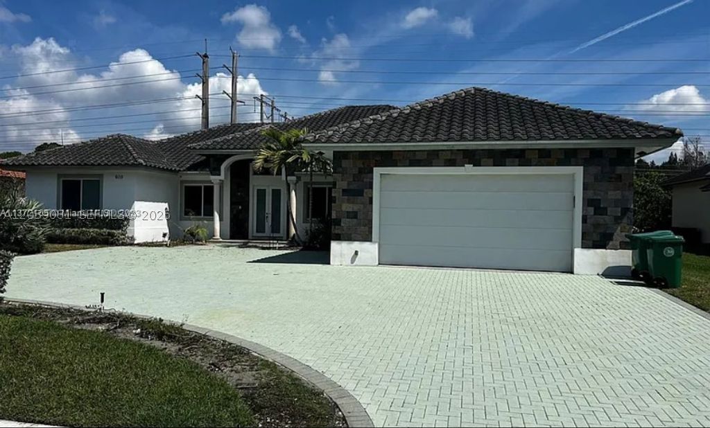 Photo of 6115 Marinel Say Dr, Davie, FL 33314 (MLS # A12039081)