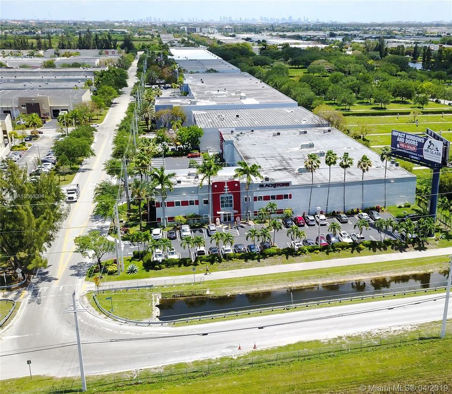 EXCELLENT INDUSTRIAL/OFFICE/ WAREHOUSE in Doral. With 34,639 Adjusted Sq Ft and a total of 42,558 Sq. Ft. of this property is Strategically located on The corner of NW 34 St and 117 Th Ave, With Full Frontage to Florida's Turnpike. Executive Offices, Work stations, meeting room, front entrance reception,.  Fully equipped kitchen and bathrooms. With High Quality Finish, Showroom space. Warehouse with full high racks included. 5 dock high ramps, 1 street level ramps and Two side street level access. Illuminated Billboard with an Income of $20,000.00 per year, With 64 parking spaces, High Security System, Fully Air Conditioner, Diesel Generator. The property can be Converted to Two spaces since there are entrances on NW 34th ST and 117th AVE.