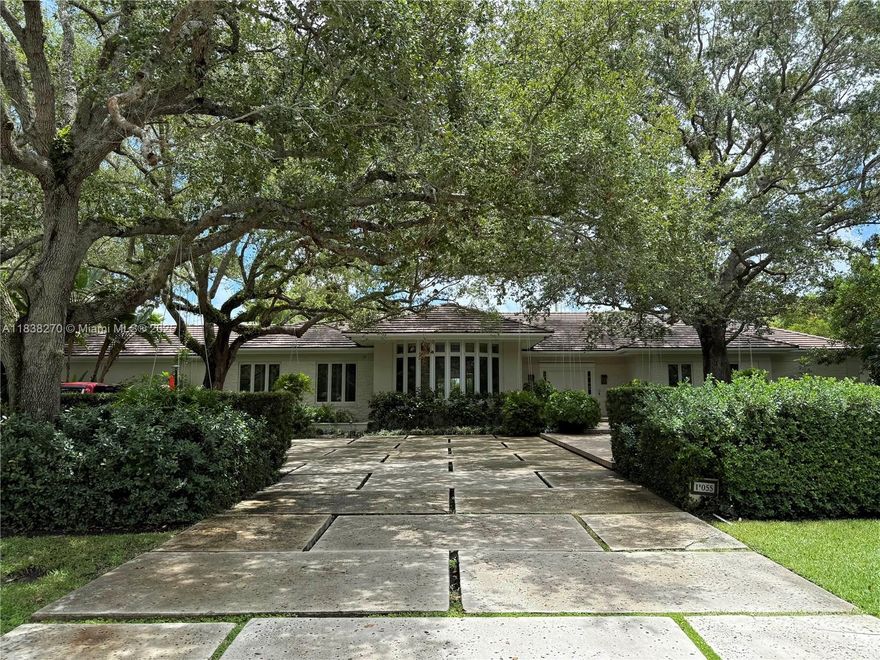 Situated on a rare acre± lot in the prestigious guard-gated community of Hammock Oaks, this one-story home presents a unique opportunity for buyers ready to renovate and personalize. While the home has been lovingly cared for, it is in need of updates and TLC to truly shine. The layout includes 4BD/4BA, plus an office that can easily convert into a 5th bedroom. A detached 1BD/1BA guest house overlooks the pool and offers flexible space for guests or extended family. Surrounded by mature landscaping and tranquil views, this property is full of potential. A true hidden gem waiting to be reimagined.