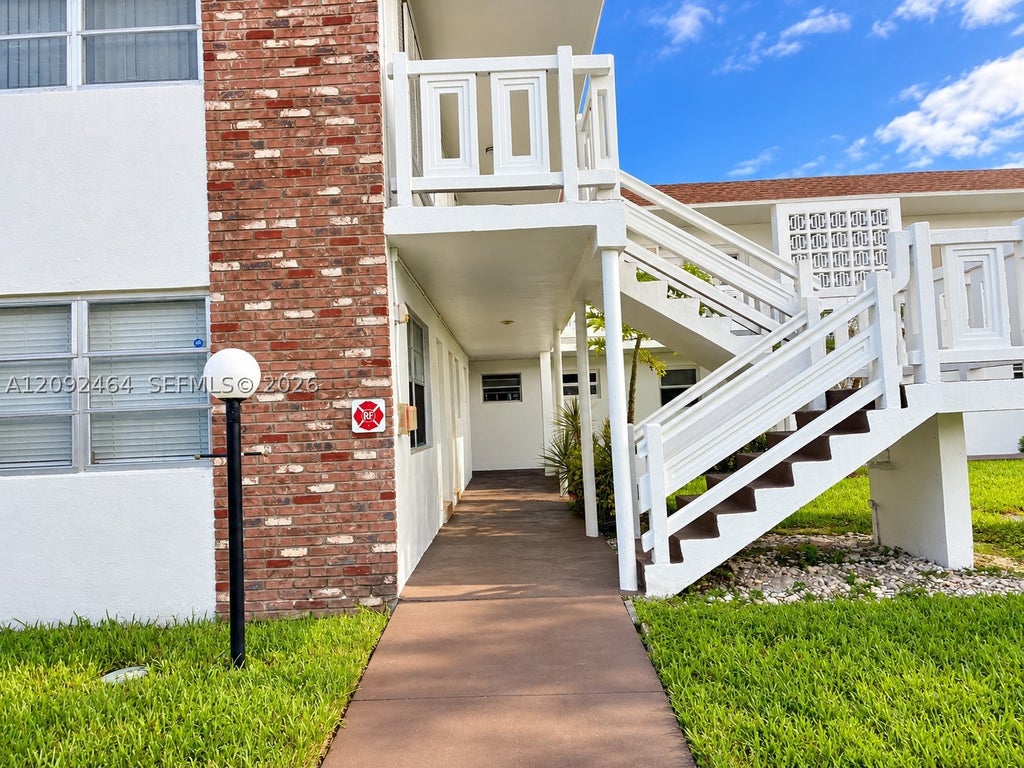 Photo of 1511 NW 43rd Ave #101, Lauderhill, FL 33313 (MLS # A12092464)