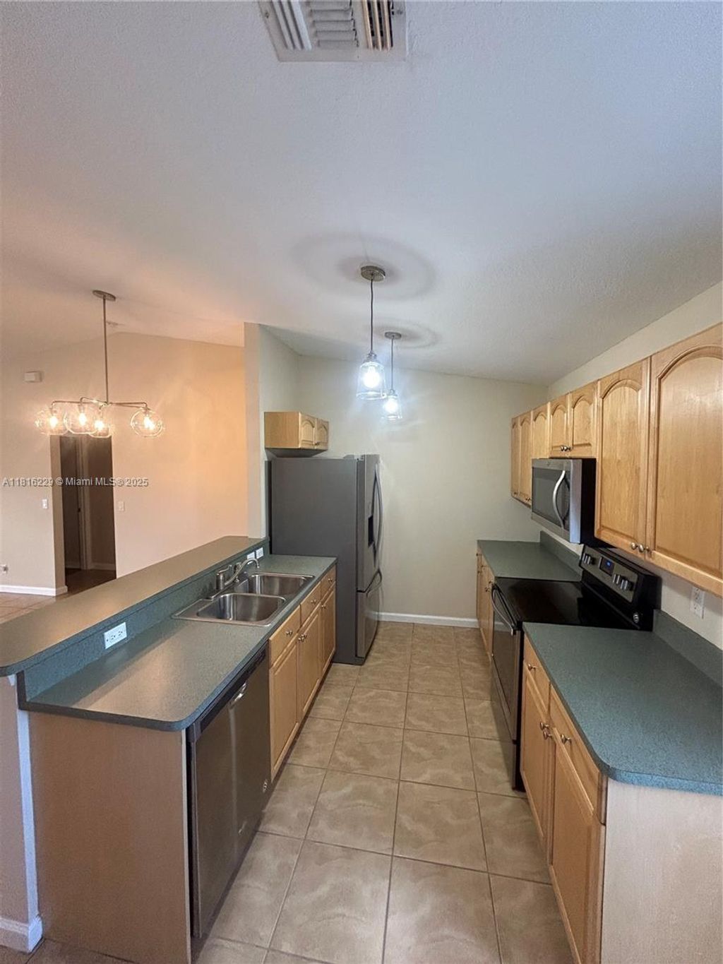 Photo of 681 NW Sharpe St, Port Saint Lucie, FL 34983 (MLS # A11816229)