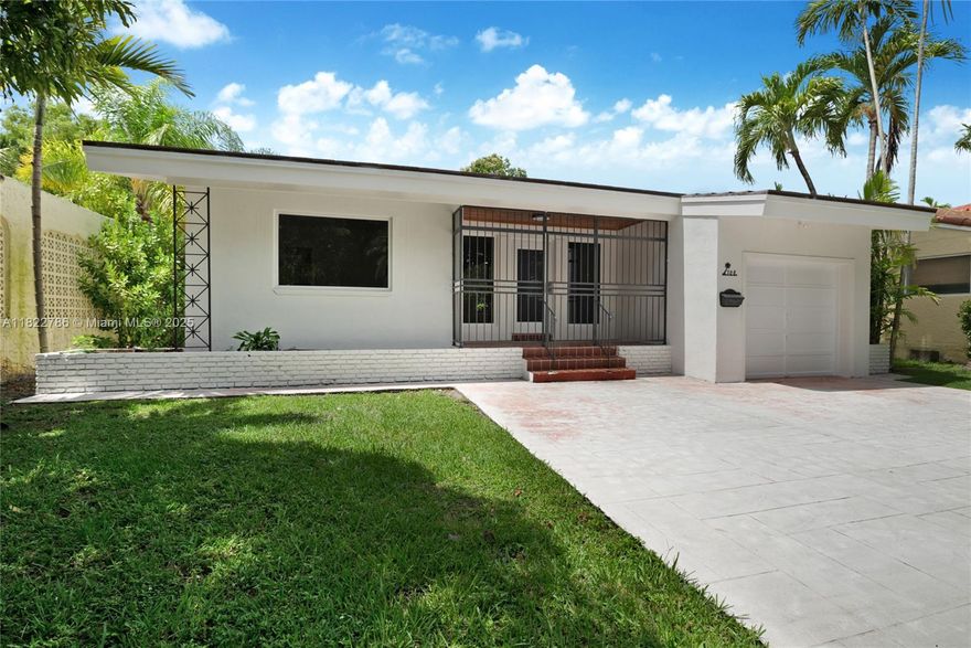 Nestled on a charming tree-lined street in the heart of Coral Gables, this beautiful 2-bedroom, 2-bathroom home offers comfortable living space on a 5,650 square foot lot. The inviting layout features spacious living areas, a large kitchen with a breakfast nook, and a formal dining room perfect for entertaining. A versatile living room area can be used as a home office, den, or playroom. Home highlights include wood flooring, energy-efficient LED lighting, impact-resistant windows and doors, and a brand-new roof.  Enjoy outdoor living with private patio areas ideal for relaxing or hosting guests. Located on a quiet street in a prime central location, this home is minutes from the Biltmore Hotel, downtown Coral Gables, Coconut Grove, golf courses, parks, and top-rated schools.
