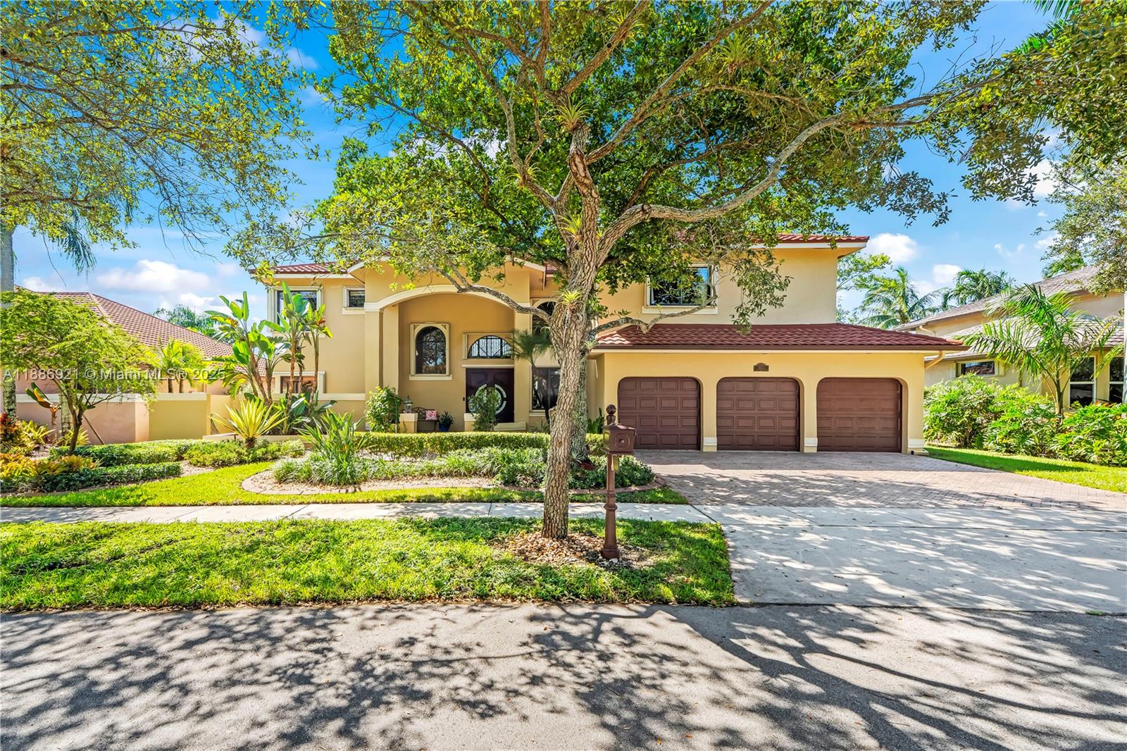 Stunning custom estate 5 bed, office, 5.5 baths, 3 car garage home in the desirable Sunset Isles of Silver Lakes with breathtaking lakefront views. The outdoor oasis features a resort-style pool, summer kitchen, covered patio, & balcony for entertaining. Inside, the main level offers a guest bedroom with full bath, private office, and cabana bath. Rich hardwood floors and expansive windows fill the home with natural light and serene water views. Gourmet kitchen with tons of storage is a chef's delight! A grand spiral staircase leads to the luxurious primary suite retreat with spa-like bath, plus three spacious guest bedrooms and two additional full baths, all bedrooms have custom closets. A rare opportunity to own a waterfront masterpiece in Silver Lakes. Metal tile roof 50 year warranty!