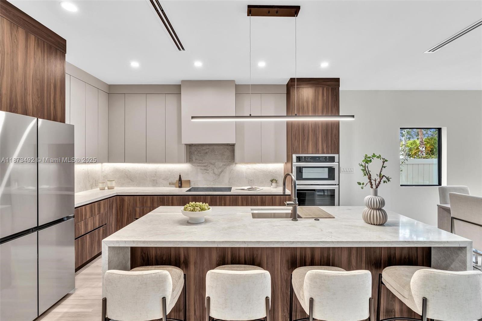 Last unit remaining this new Construction with Pool & Rooftop Deck with outdoor kitchen in Silver Bluff! This modern tri-level townhome, move in ready, blends style and comfort near The Roads. It offers 3 beds, 3.5 baths, and a luxe master suite with dual walk-in closets. Enjoy Italian porcelain tile, stainless steel appliances, and impact windows. Relax in your private backyard pool or entertain on the rooftop deck with pergola. Smart tech includes smart doorbell and thermostat. Designed for the ideal live-work-play lifestyle. Don’t miss your chance to own in this prime location!