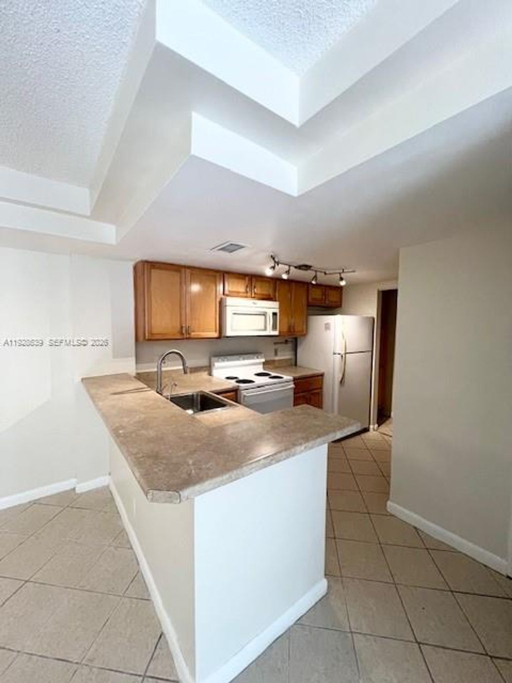 Photo of 10709 Cleary Blvd #105, Plantation, FL 33324 (MLS # A11928639)