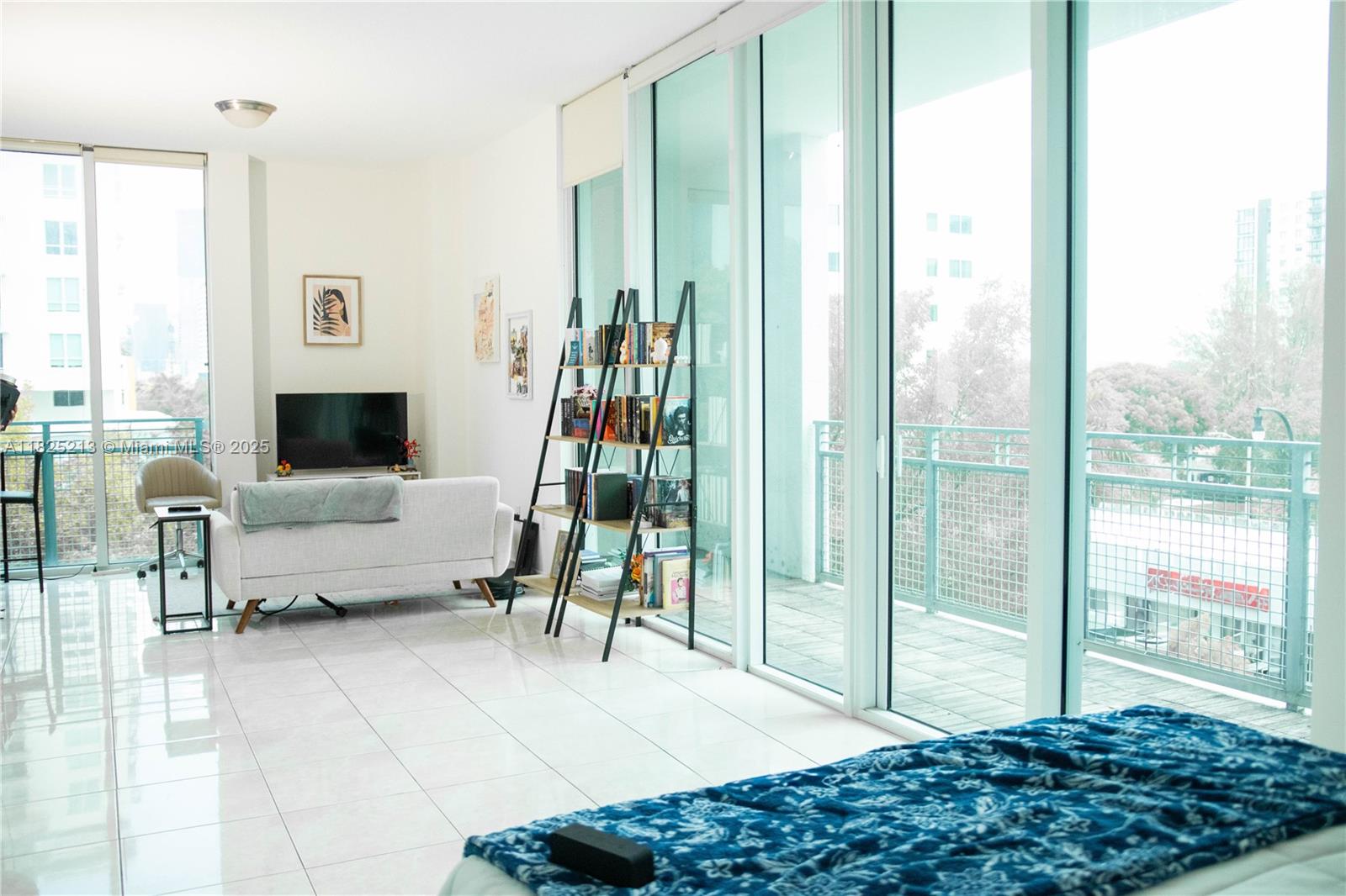 Modern 1-Bedroom Corner Loft in the Heart of Edgewater. This bright & spacious condo features 10' ceilings and wraparound floor-to-ceiling windows that fill the space with natural light. The layout offers a private balcony, blackout blinds & modern upgrades like new washer and dryer, new dishwasher, granite countertops & tile flooring. Located in a secure mid-rise building offering 24/7 concierge, newly remodeled fully equipped gym, oversized pool with bay views, sauna, hot tub, yoga studio, media room, & business center. Included: Parking spot on same floor as unit, parking pass, fob & storage unit. Enjoy the best of Edgewater—just minutes from Brickell, Downtown, Wynwood, Midtown, South Beach, the Airport, the Design District, restaurants, Wholefoods, Edgewater Farmer’s Market & shops.