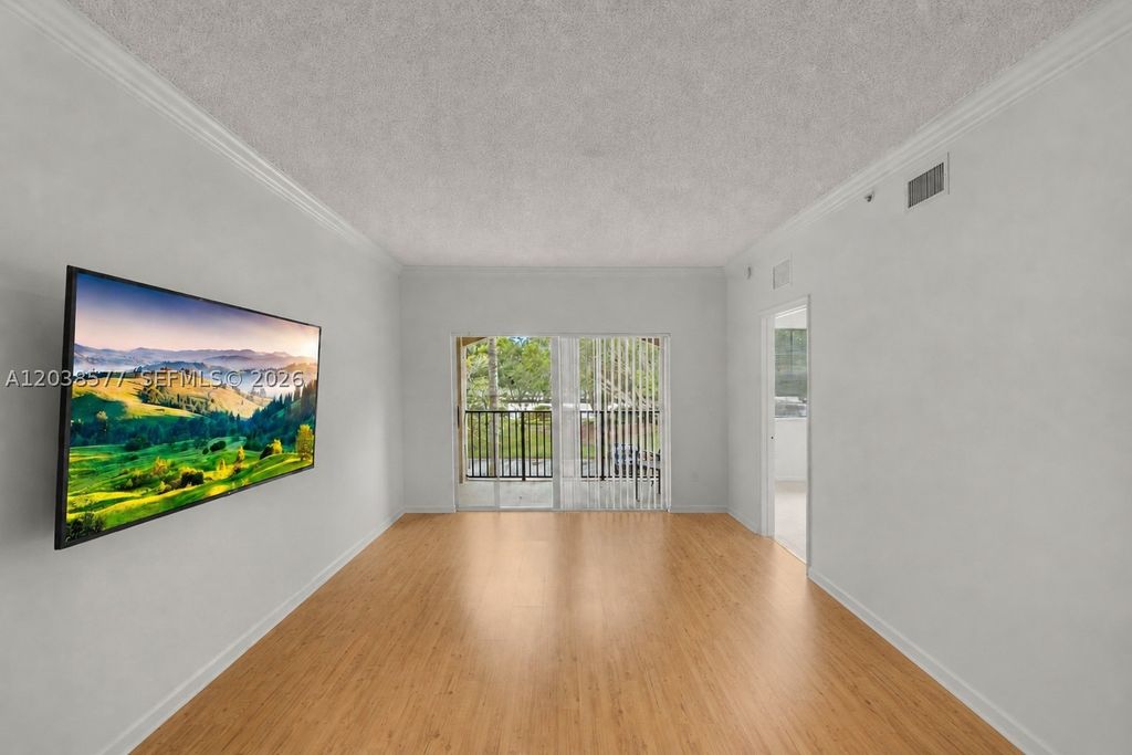 Photo of 5880 W Sample Rd #203, Coral Springs, FL 33067 (MLS # A12038577)
