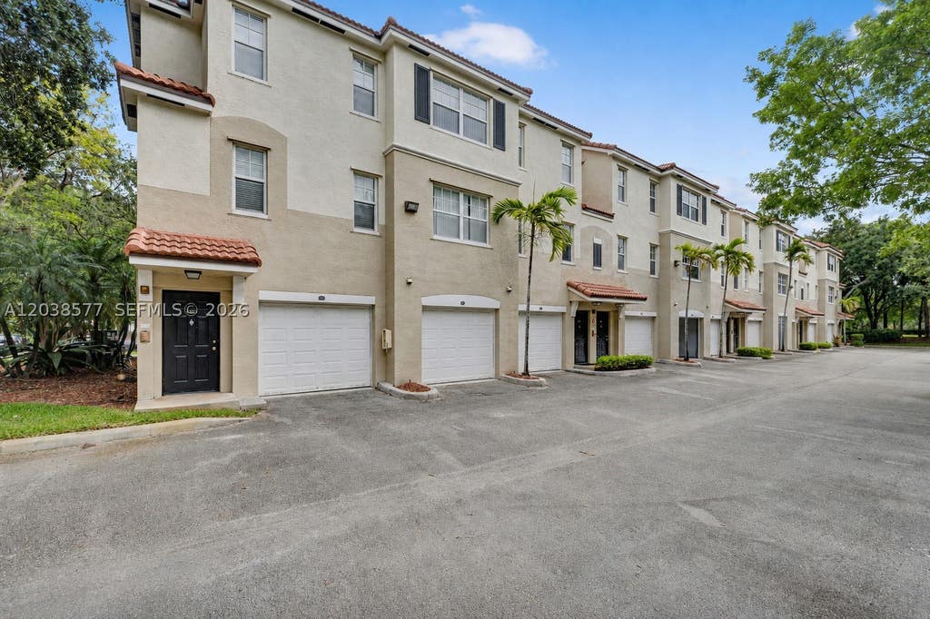 Photo of 5880 W Sample Rd #203, Coral Springs, FL 33067 (MLS # A12038577)