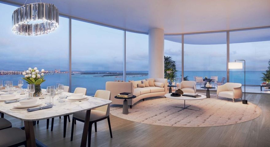 This brand-new 5-bedroom, 6.5-bath bayfront residence at UNA offers breathtaking, unobstructed views of Biscayne Bay, the Atlantic Ocean, and the Miami skyline. Spanning 4,725 interior square feet plus 797 square feet of expansive terraces, the residence includes a den and dedicated housekeeping quarters. Offering exceptional privacy with just two residences per floor, the home features private elevator entry into a flow-through layout. Floor-to-ceiling "lift-and-glide" glass doors, glass balcony railings, and 10’8” ceilings flood the home with natural light and seamless indoor-outdoor living. The chef’s kitchen is equipped with Gaggenau appliances, including induction cooktop and integrated refrigeration. The primary suite features separate his-and-hers bathrooms and walk-in closets. Amenities include private boat slips, three pools, jacuzzi, children’s splash area, state-of-the-art gym with personal training and yoga, spa with steam room and sauna, private movie theater, dog walk area, BBQ and entertaining spaces, and lush gardens designed by Enzo Enea. Designed by Adrian Smith + Gordon Gill Architecture, UNA is inspired by the elegant shapes and refined materials of classic yacht design, minutes from Brickell, Coconut Grove, Downtown, and Key Biscayne.
