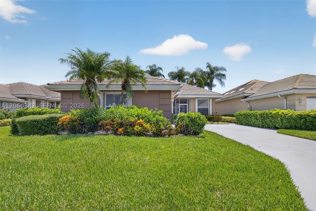 Photo of 169 NW Bentley Cir, Port St Lucie, FL 34986 (MLS # A12060341)