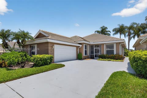 Photo of 169 NW Bentley Cir, Port St Lucie, FL 34986 (MLS # A12060341)