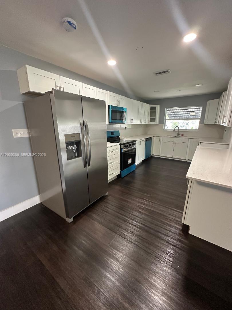 Photo of 4530 NW 23rd St #4530, Lauderhill, FL 33313 (MLS # A12030386)