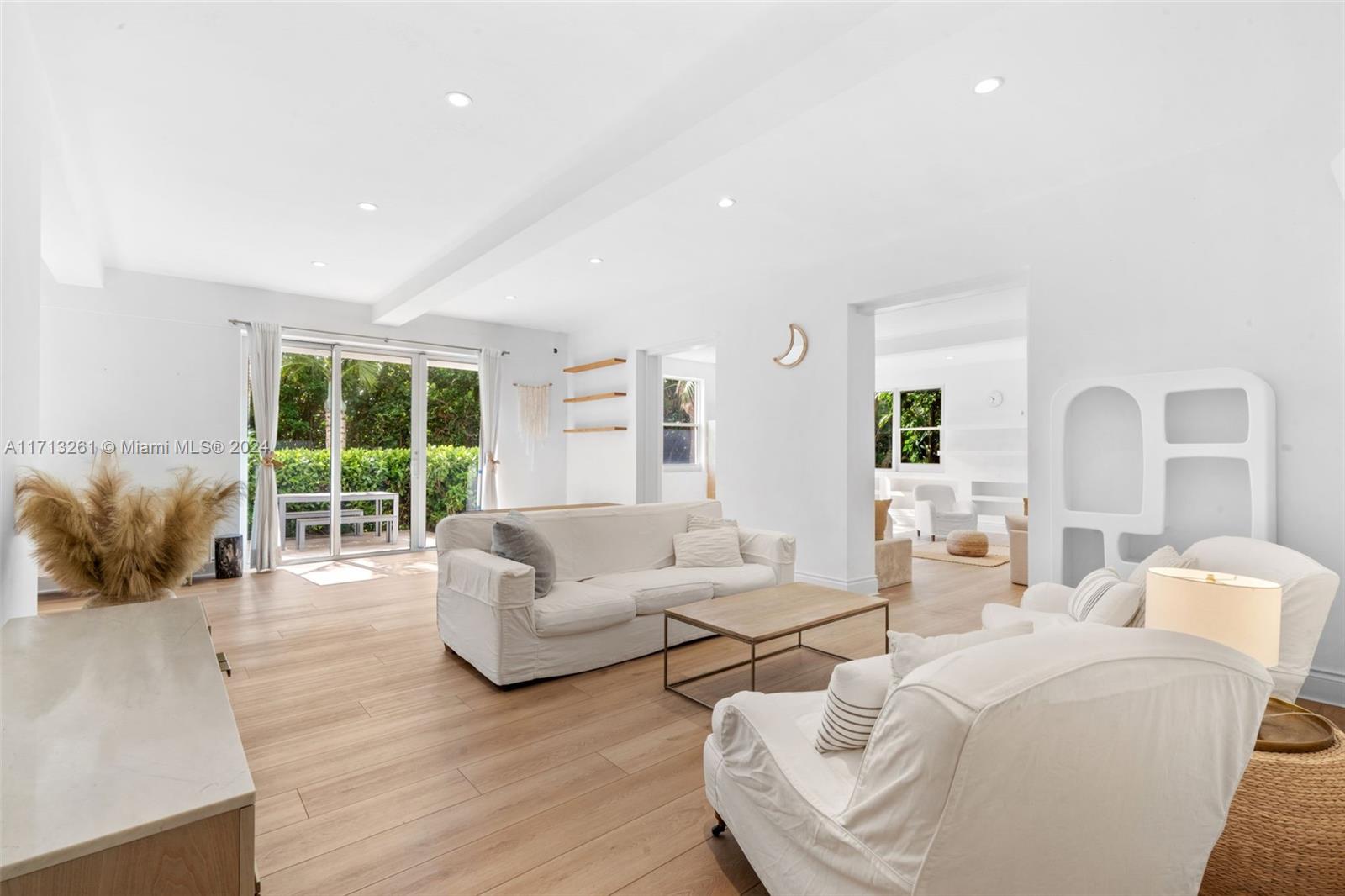 Stunning 4 bedroom apartment with an expansive view overlooking the garden and ocean. It has a house feeling with an open-concept living area, where large glass windows fill the space with natural light, providing uninterrupted views of the garden. The kitchen with a breakfast bar perfect for casual dining. The dining area is positioned to take full advantage of the green view, making meals feel like an outdoor experience even indoors. One of the bedrooms facing the garden has it own kitchenette. The hardwood floors throughout the apartment add a sense of warmth and coziness. Each of the four bedrooms is generously sized. The patio has a sense of privacy and exclusivity while not obstructing the view, where you can relax and enjoy the ocean breeze. *Condo Size 2,710 SF*