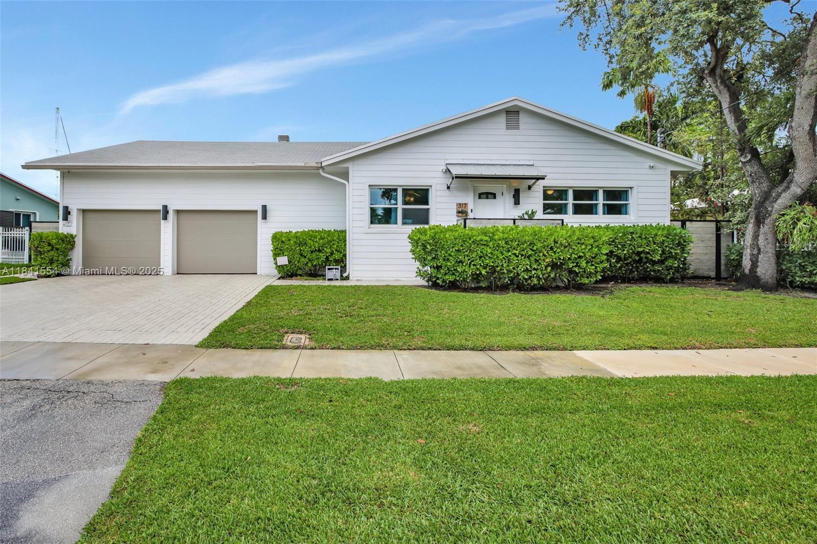 Discover waterfront tranquility in this unique Dania Beach home. The main house features 2 bedrooms, 2 bathrooms, a spacious 2-car garage with plenty of storage space and a large open kitchen ideal for entertaining. Adjoining the main house is a charming cottage with 1 bedroom, 1 bathroom, a full second kitchen, and a cozy living area, perfect for guests or extended family. Enjoy the serene canal views from your private dock, and unwind in the refreshing pool. This unique property offers the perfect blend of comfort, privacy and waterfront living in desirable Dania Beach.
