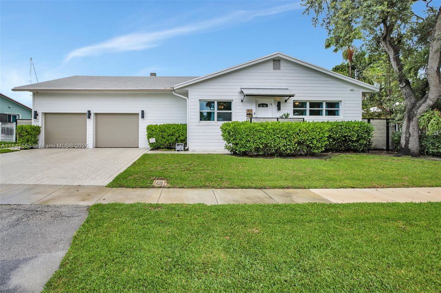 Discover waterfront tranquility in Dania Beach with this unique residence offering both a main home and a guest cottage. The main house features 2 bedrooms, 2 baths, a spacious 2-car garage with abundant storage, and a large open kitchen ideal for entertaining. The adjoining 1-bedroom, 1-bath cottage includes a full kitchen and cozy living area, perfect for guests, in-laws, or rental income. Enjoy serene canal views from your private dock and unwind by the sparkling pool surrounded by lush landscaping. This property blends comfort, privacy, and waterfront living just minutes from beaches, Dania Pointe, marinas, and Fort Lauderdale-Hollywood International Airport.