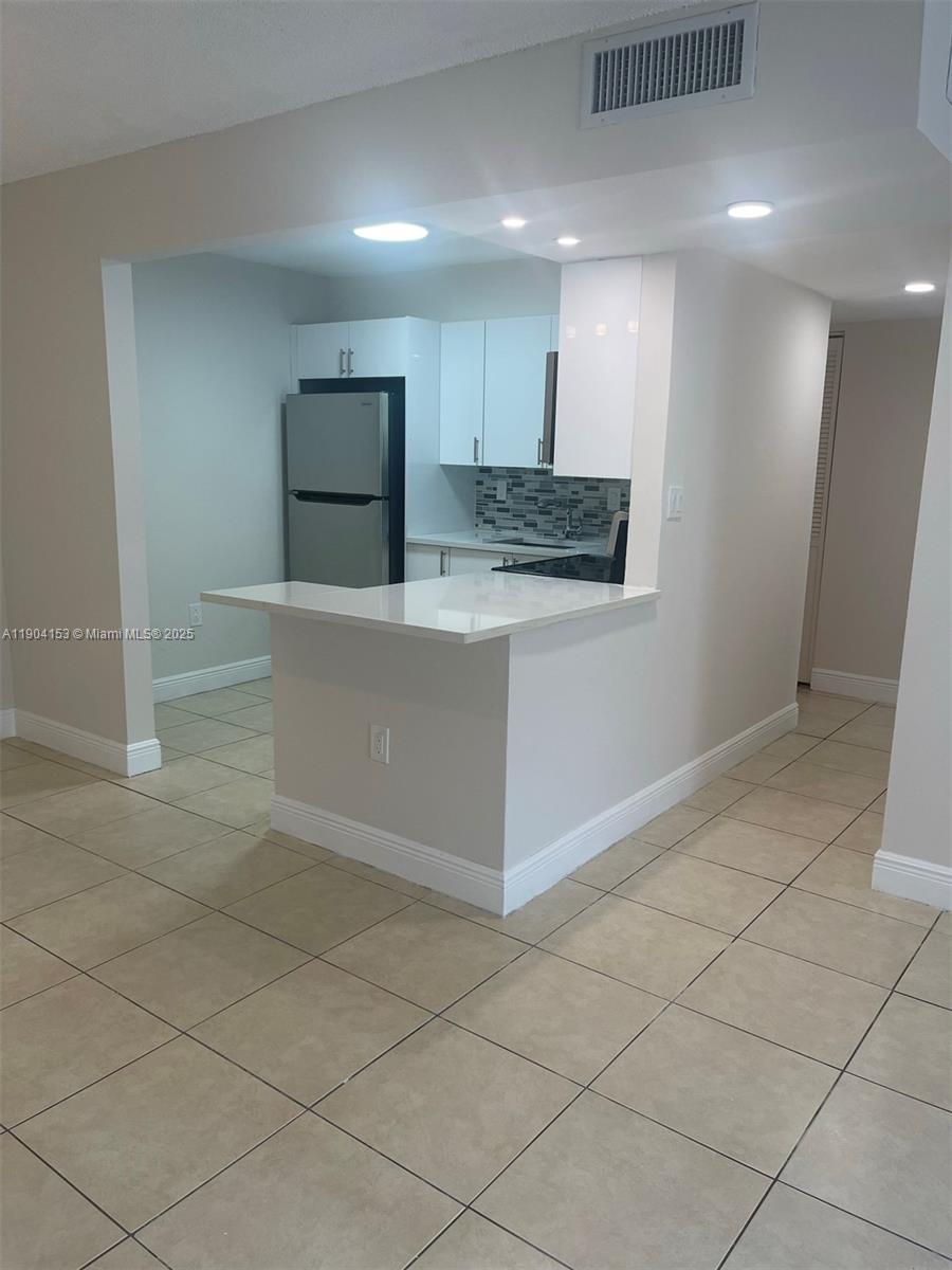 DORAL GARDENS II CONDO - Residential Lease