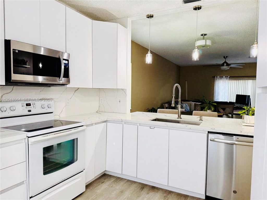 Photo of 16213 Emerald Cove Rd, Weston, FL 33331 (MLS # A12018064)