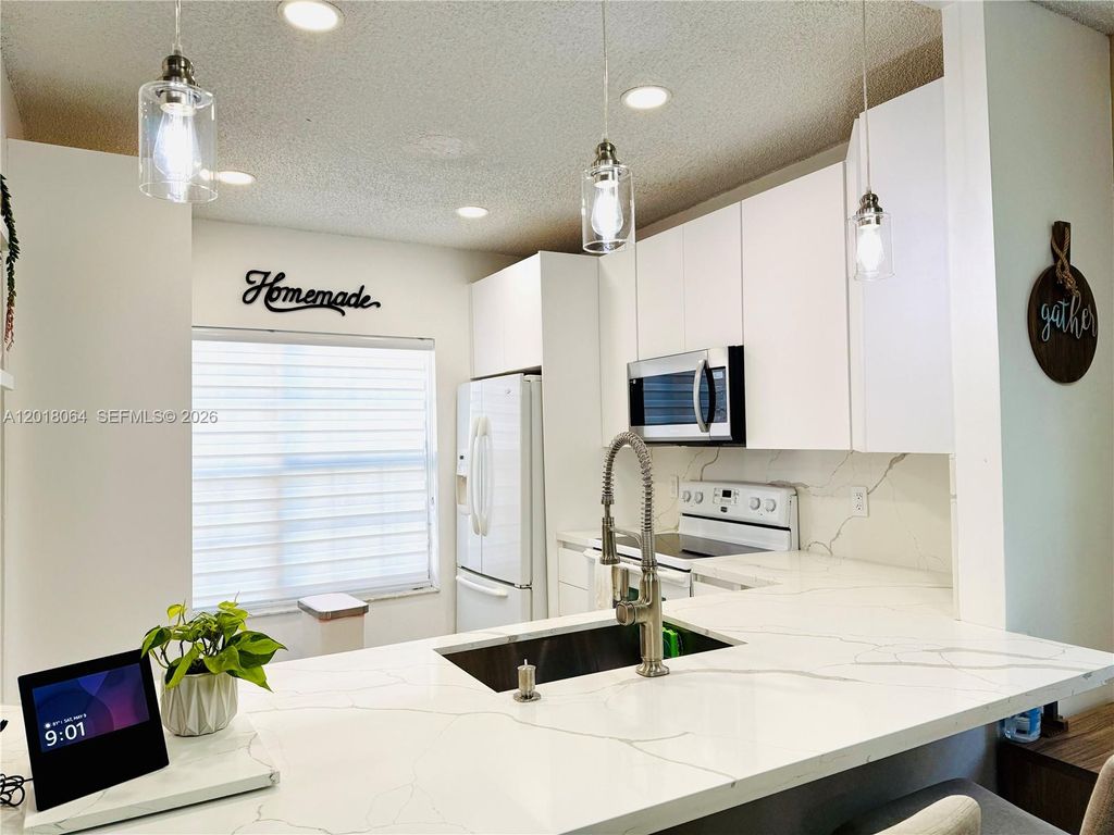Photo of 16213 Emerald Cove Rd, Weston, FL 33331 (MLS # A12018064)