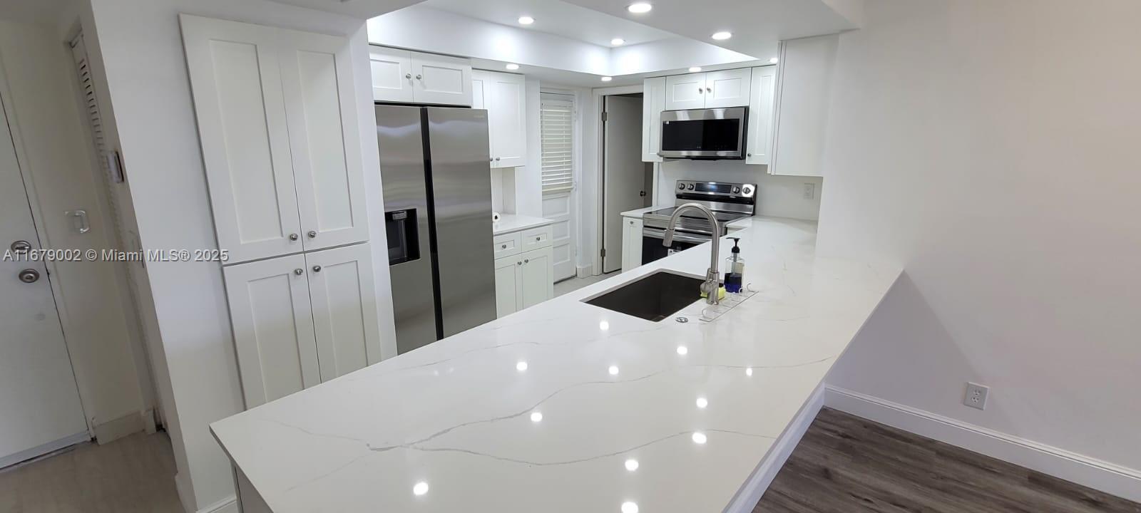 Back on the market 01/13/2025 fully renovated. 2 Master Bedroom Split floor plan with 2 full baths and bonus room could use as 3rd bedroom in an upscale 55+ Community. Stunningly Updated GREAT LOCATION 2 mil to the Atlantic Ocean in Boca Raton. Layout has jack and jill bathroom set up. 3RD Floor with Elevator, and washer and dryer in the unit plus another laundry room in the lobby area. Pool and Boca Raton Park and Recreation Area View from the screened patio. The unit is very well kept, brand new A/C and appliances, freshly painted. Includes basic cable, water, internet, and common areas. Close to Boca Downtown, and trendy Delray, restaurants, shopping. 25 minutes to West Palm Beach or Fort Lauderdale Airport. Close to Parks and Recreation. Priced to rent fast! Great opportunity!!