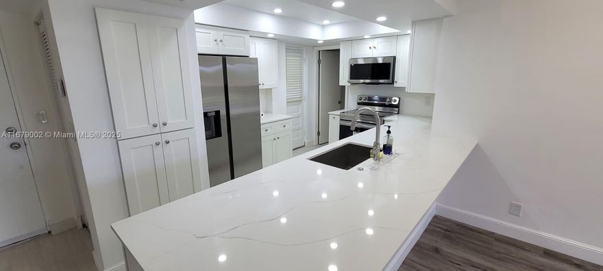 Back on the market 01/13/2025 fully renovated. 2 Master Bedroom Split floor plan with 2 full baths and bonus room could use as 3rd bedroom in an upscale 55+ Community. Stunningly Updated GREAT LOCATION 2 mil to the Atlantic Ocean in Boca Raton. Layout has jack and jill bathroom set up.  3RD Floor with Elevator, and washer and dryer in the unit plus another laundry room in the lobby area. Pool and Boca Raton Park and Recreation Area View from the screened patio. The unit is very well kept, brand new A/C and appliances, freshly painted. Includes basic cable, water, internet, and common areas. Close to Boca Downtown, and trendy Delray, restaurants, shopping. 25 minutes to West Palm Beach or Fort Lauderdale Airport. Close to Parks and Recreation.  Priced to rent fast! Great opportunity!!