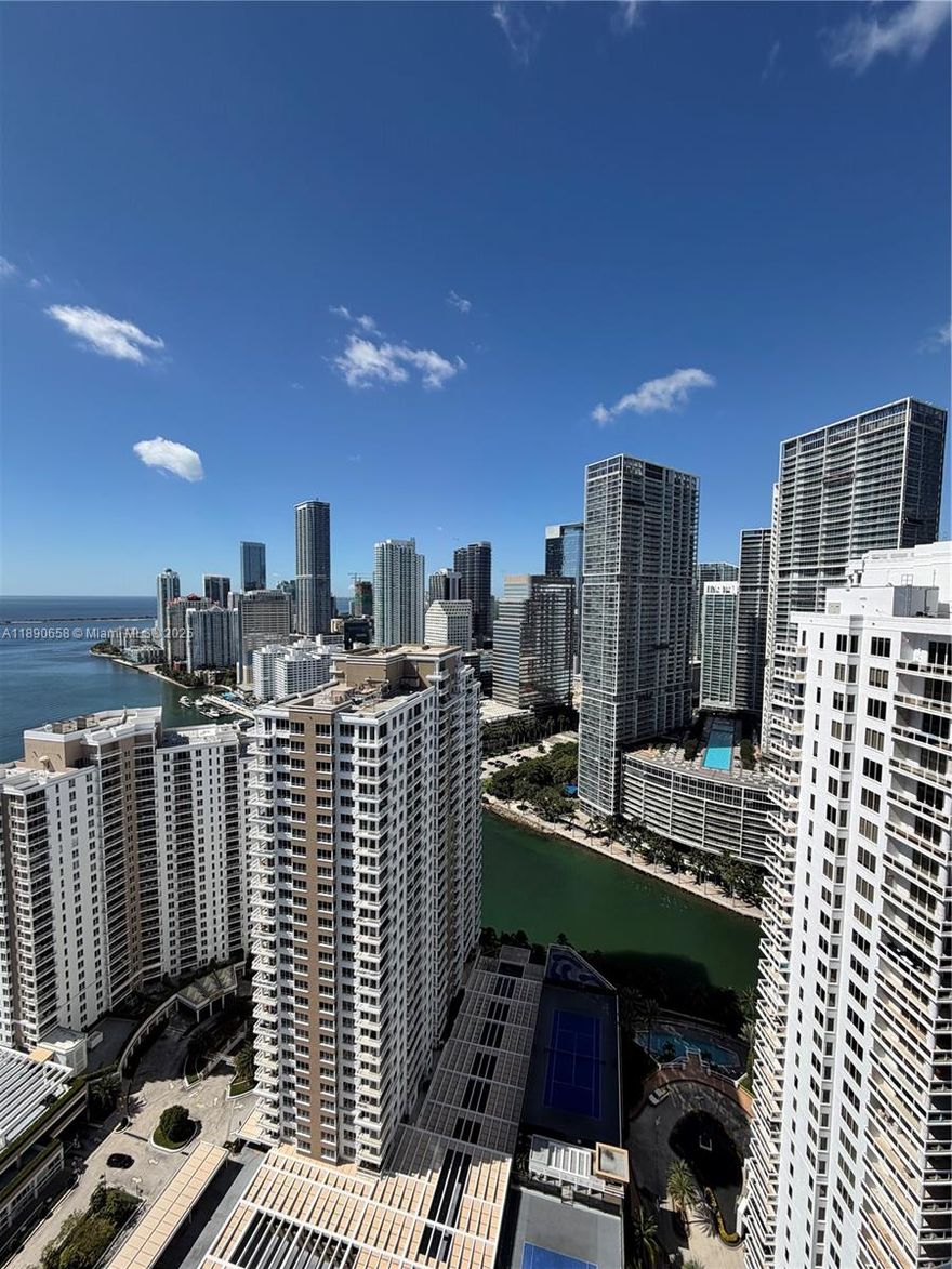 Beautiful Penthouse 2 bedrooms, 2 1/2 baths located in brickell key, high ceilings, private elevator, valet, tennis courts, gym and more