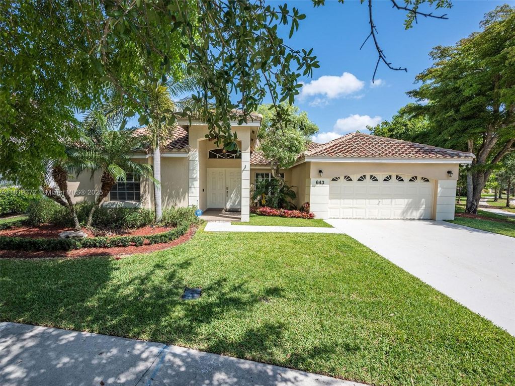 Photo of 643 Lake Blvd, Weston, FL 33326 (MLS # A11819372)