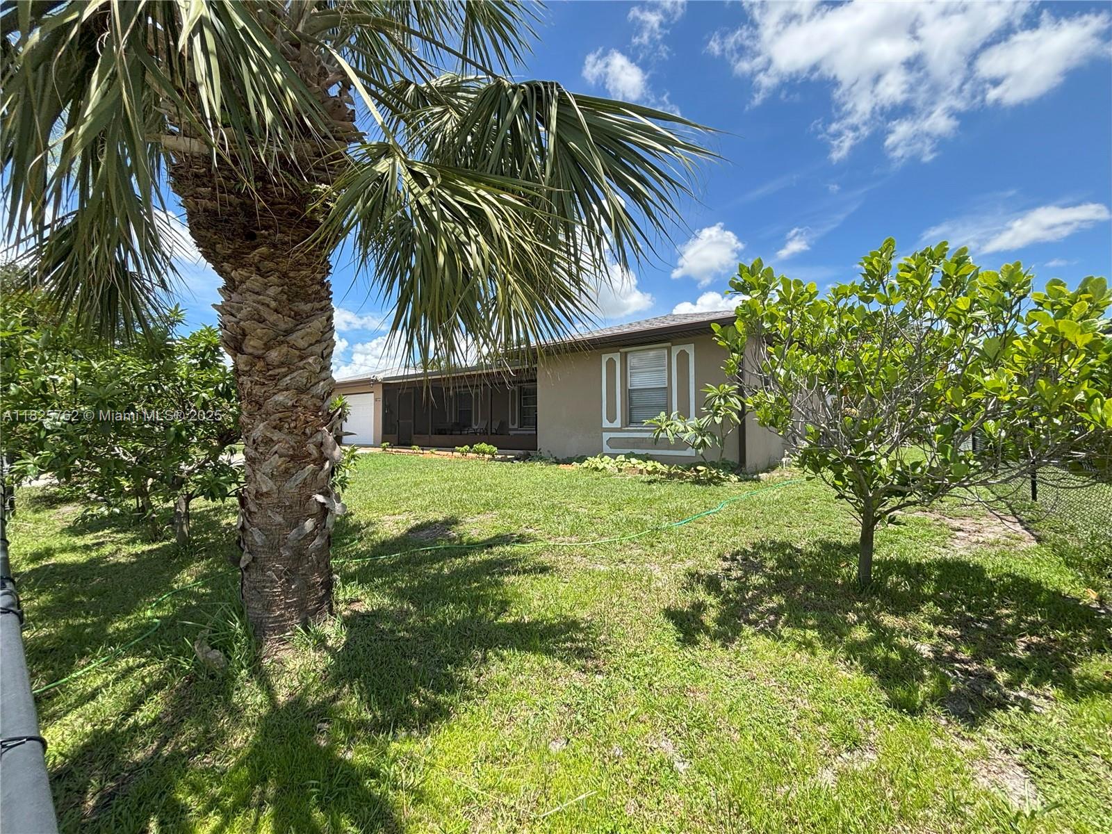 Location! Location! Great Neighborhood! This Single Family residence with 2022 roof, 2019 A/C, Screened Back & Front lanai, 2022 well Pump, Septic Tank replaced in 2019 New Appliances, 2021 Washer and Dryer, Remodeled Kitchen and Guest Bathroom, ALL FENCE, Fruit trees (Avocado, Coco, Mango, Peppers, Lemon, Wax Apple), new Ceiling fans, Fresh painted inside. City Water and Well system for the garden. NO Restrictions, you can park your RV or boat. Have a lot of space in the Driveway and both sides of the house. The Backyard had plenty space for your new pool or wherever you want. Entertain guests, making barbecue, etc. DON'T MISS THIS OPPORTUNITY of buy this beautiful and very well maintenance family home!!
