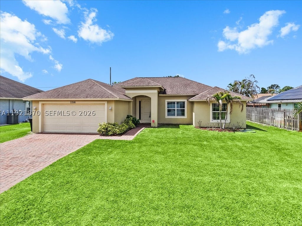 Photo of 1156 SW Alexandria Ave, Port St Lucie, FL 34953 (MLS # A11921870)