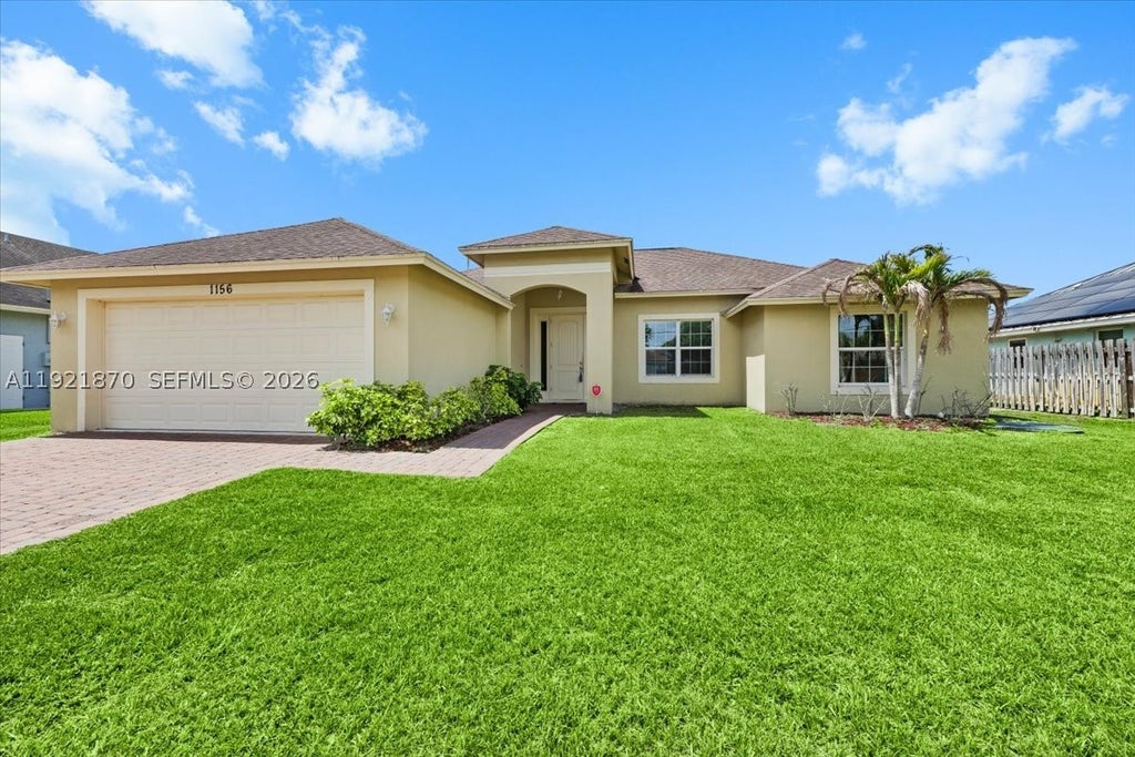 Photo of 1156 SW Alexandria Ave, Port St Lucie, FL 34953 (MLS # A11921870)