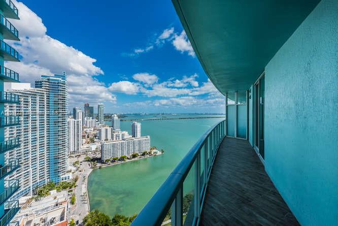 Large 1/1 with excellent unobstructed NE-bay views from this 35th floor condo! Best lay-out in the building, located in popular South Tower! Was remodeled 4 years ago with new porcelain tile in wood grain finish inside and outside, new closet, new blinds and motorized drapes, fridge and dishwasher less than 2years old and more. Quantum offers 5-star amenities such as large gym, several meeting and club areas with bay views, 2 pools for morning and afternoon sun enjoyment - great location in front of bay and Margaret Pace park! Walk to shopping & dining, close to Brickell, Downtown, Beaches, Wynwood, Midtown, Design District, airport, hospitals !