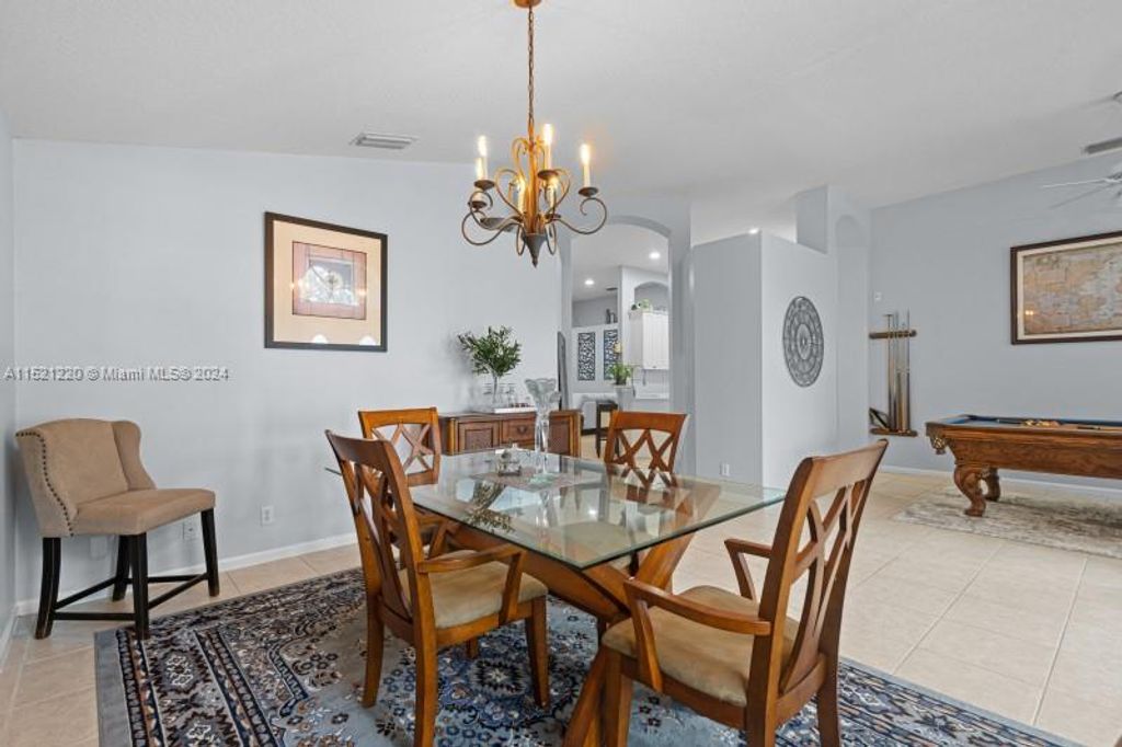 Photo of 8577 SW Sea Captain Dr, Stuart, FL 34997 (MLS # A11521220)