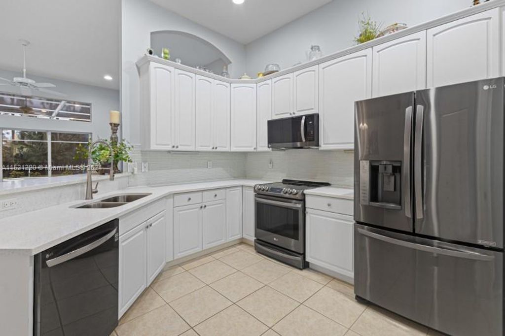 Photo of 8577 SW Sea Captain Dr, Stuart, FL 34997 (MLS # A11521220)