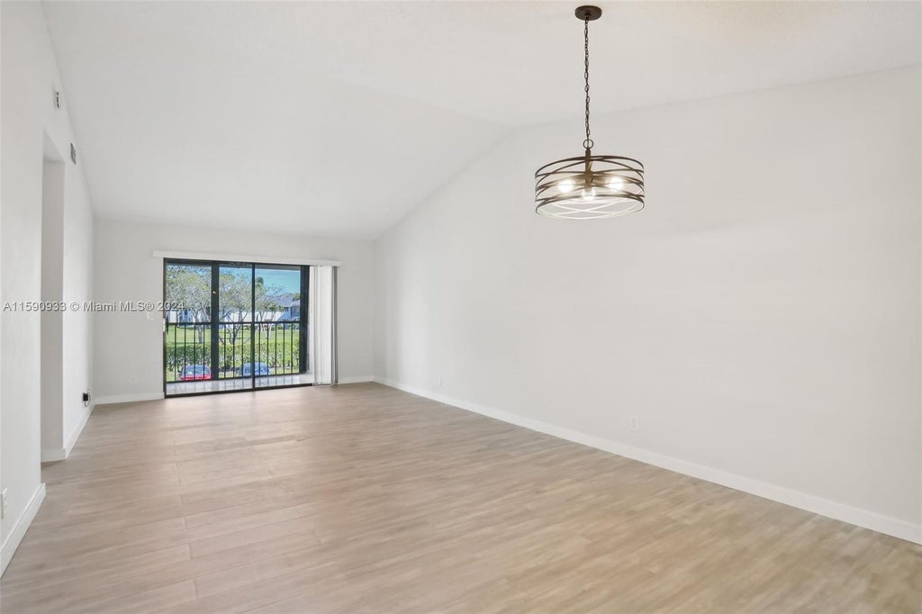 Photo of 15234 Lakes Of Delray Blvd #277, Delray Beach, FL 33484 (MLS # A11590933)