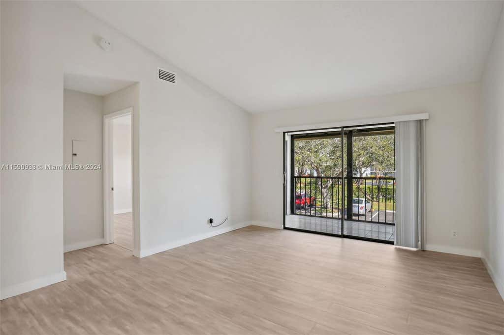 Photo of 15234 Lakes Of Delray Blvd #277, Delray Beach, FL 33484 (MLS # A11590933)