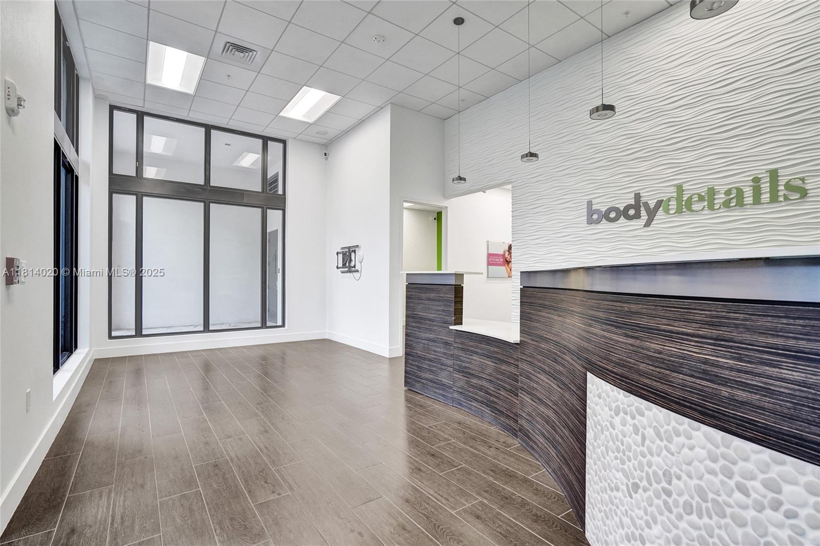Prime 1,597 SF ground-level space at Merrick Manor, fully built out and move-in ready. Features 4 treatment rooms, 1 bathroom, storage/A/V closet, reception, and waiting area. Ideal for retail, medical, office, or coffee shop use. Located steps from Shops at Merrick Park and high-traffic Le Jeune and Bird Rd intersection. Merrick Manor offers 227 luxury residences and 20,000 SF of retail including Sweat 440, jewelry store, orthodontist, Sierra Furniture, and IV therapy. Join the thriving business community in Coral Gables.