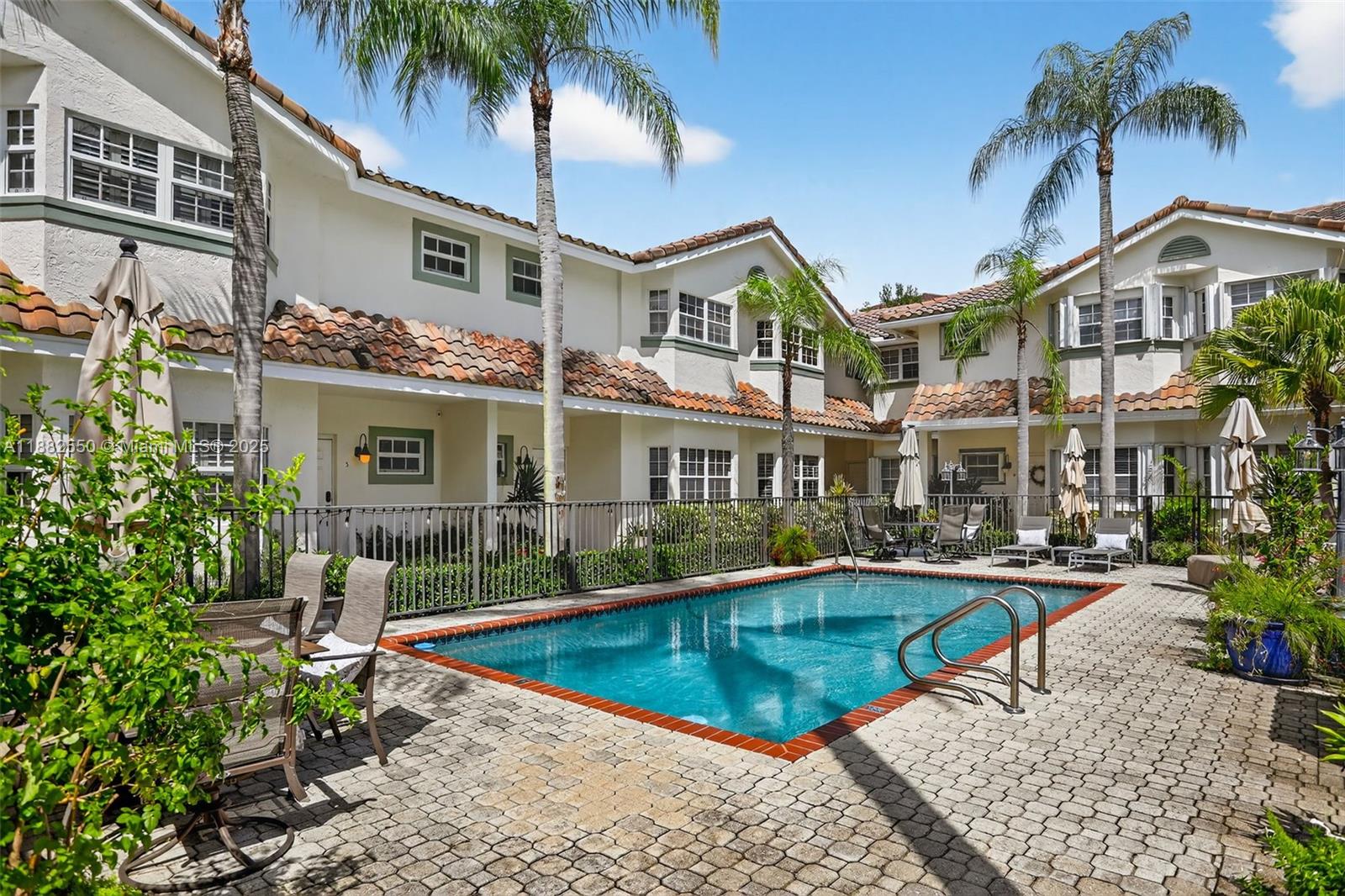 Live in the heart of Victoria Park! This beautifully remodeled 2-bed, 2.5-bath townhome features a bright, open layout with high ceilings, porcelain tile floors, and modern finishes. The kitchen offers granite countertops, stainless steel appliances, and a breakfast bar. Enjoy new hurricane impact windows and doors throughout. Upstairs includes a split floor plan with two spacious master suites, each with walk-in closets and en-suite baths. Relax on the large private fenced patio ideal for entertaining. Includes in-unit laundry and assigned parking. Located in a quiet, well-maintained community with low HOA fees that include flood insurance. Steps to Holiday Park, Parker Playhouse, and minutes to Las Olas, beaches, shopping, and dining.