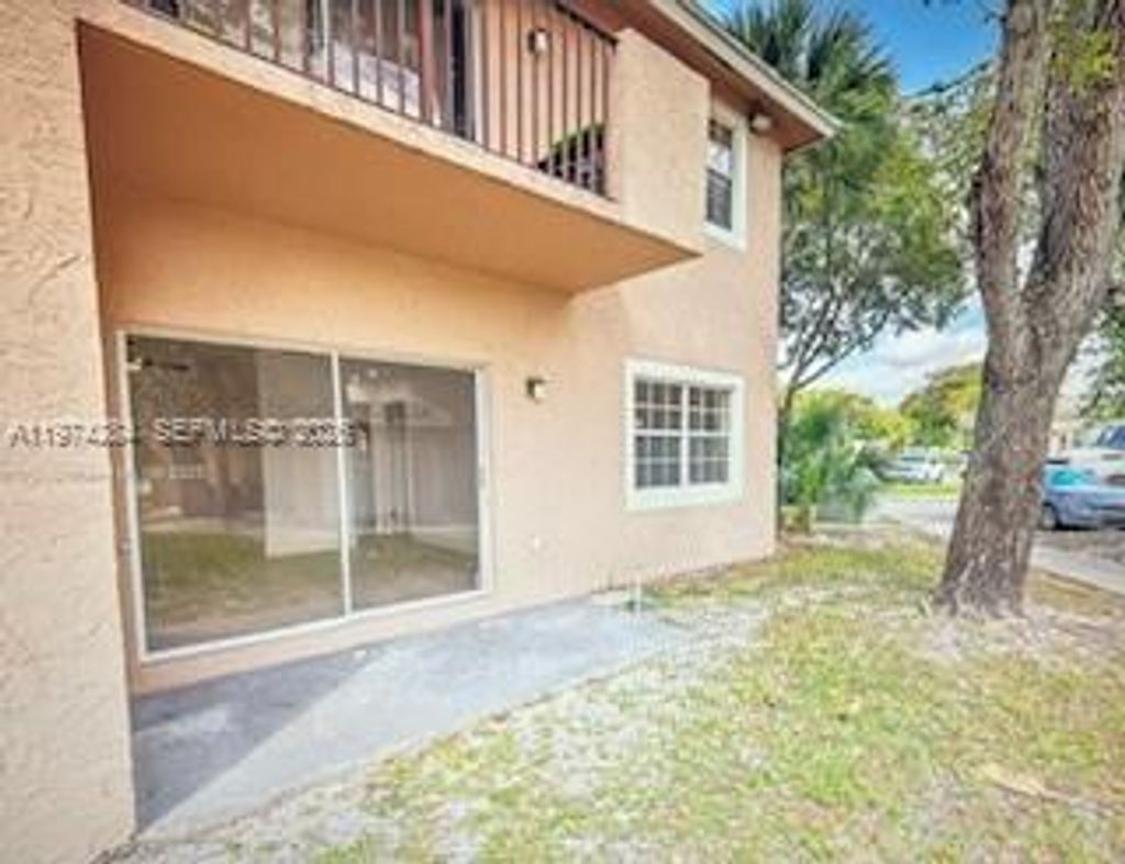 Photo of 1941 NW 96th Ter #8F, Pembroke Pines, FL 33024 (MLS # A11974284)