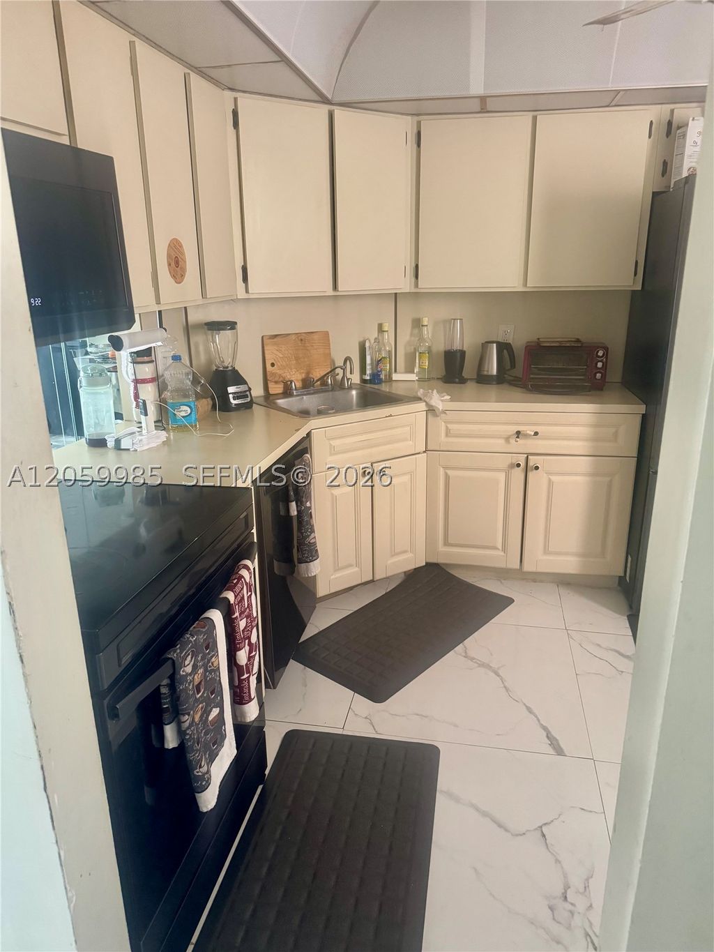 Photo of 6361 N Falls Cir Dr #311, Lauderhill, FL 33319 (MLS # A12059985)