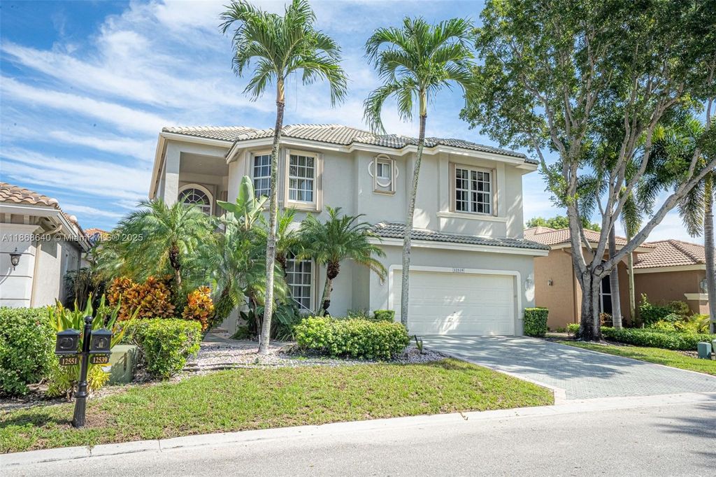 Photo of 12539 NW 58th Mnr, Coral Springs, FL 33076 (MLS # A11868640)