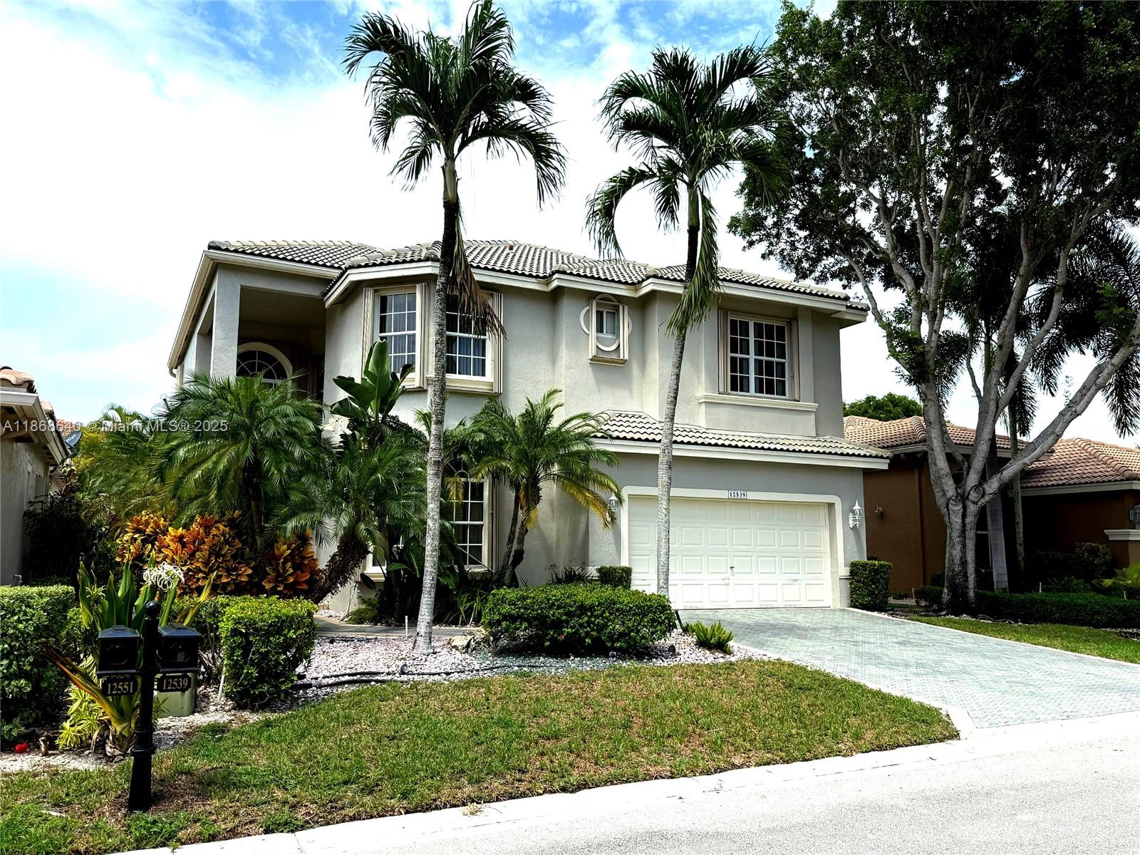 Very Motivated Sellers. Discover elegance and comfort in this spectacular 5-bedroom + loft home in the exclusive Heron Bay community. Enjoy your own private pool, spa, and spacious interiors featuring a Spacious kitchen with wood cabinets and stainless steel appliances. The primary suite and an additional bedroom are conveniently located on the first floor, while the remaining bedrooms and loft provide the perfect layout upstairs. Surrounded by resort-style amenities including gym, tennis courts, pools, and 24/7 security. The perfect combination of comfort, location, and lifestyle. Two A/C's Both 2023